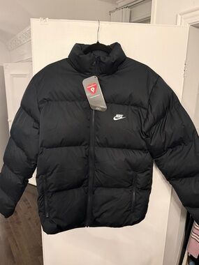 Nike Black Quilted Puffer Jacket with White Swoosh Tag